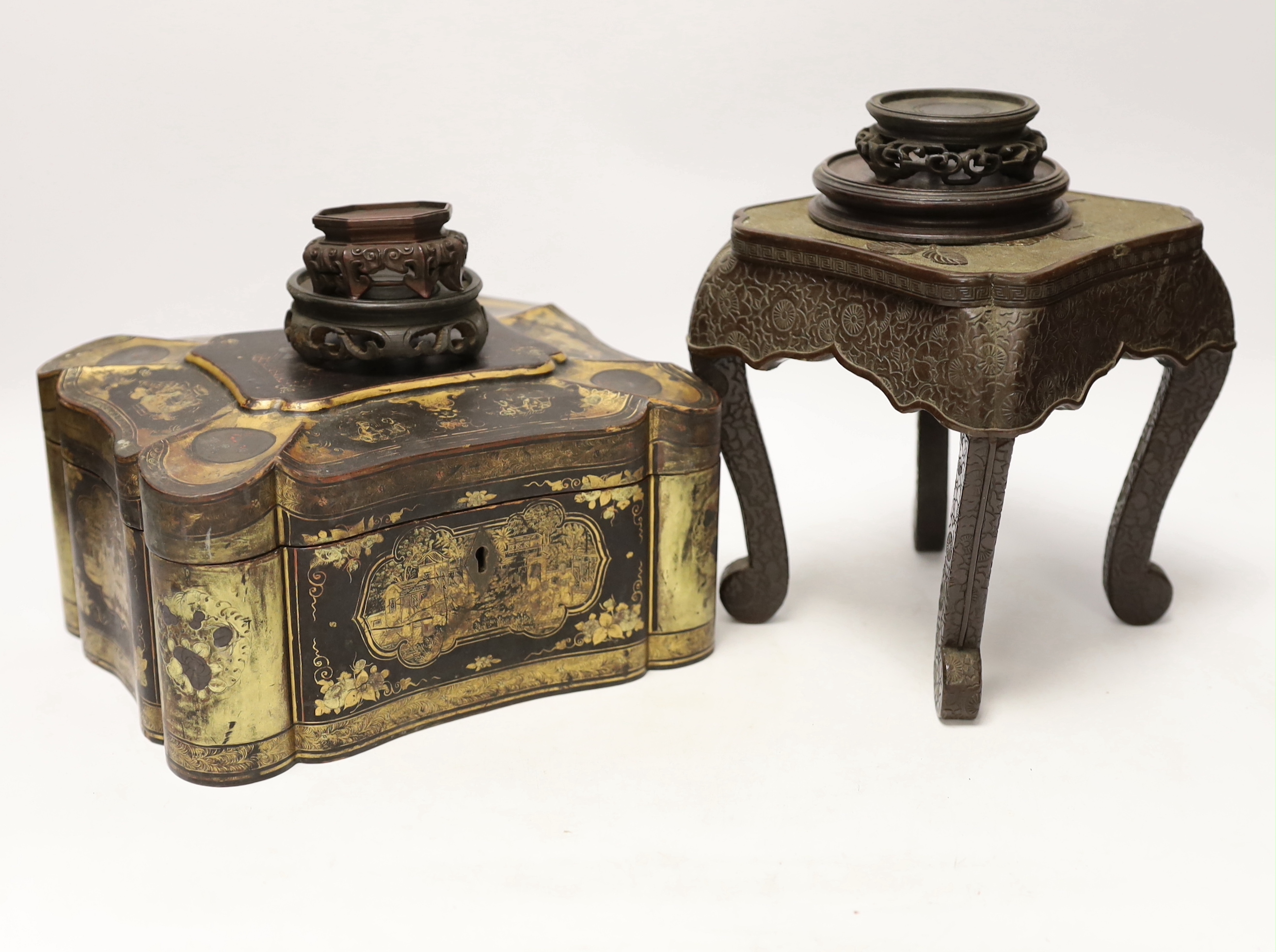 A Chinese lacquer and gilt casket together with various carved stands, largest 17cm high